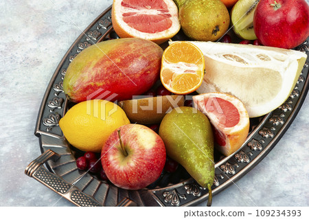 Assortment of fruits on a vintage tray. 109234393