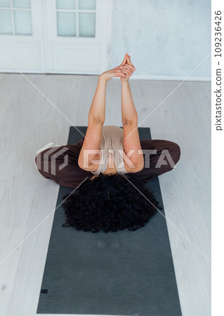 Asana Yoga On Floor Flexible Woman Fitness Gymnastics Asana Yoga On Floor Flexible Woman Fitness Gymnastics 109236426