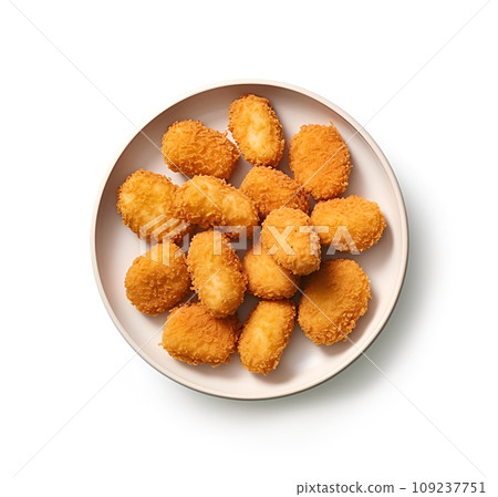 Nuggets on a white plate on a white background Nuggets on a white plate on a white background 109237751