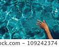 Swimming in a pool. Summer holidays concept. 109242374