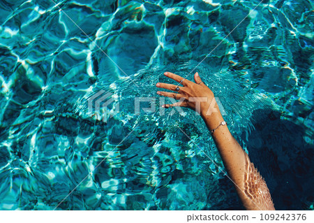 Swimming in a pool. Summer holidays concept. 109242376