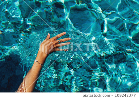 Swimming in a pool. Summer holidays concept. Swimming in a pool. Summer holidays concept. 109242377