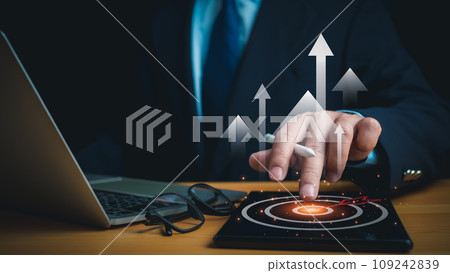 Businessman pointing to the target. Business concept. management concept business planning concept Businessman pointing to the target. Business concept. management concept business planning concept 109242839