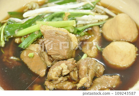 braised pork tendon and meatball with bean sprout in brown soup on bowl braised pork tendon and meatball with bean sprout in brown soup on bowl 109243587