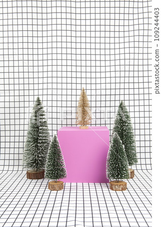 pink cube miniature forest and grid background 109244403