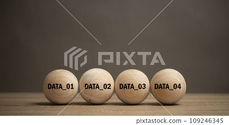 Text data storage concept on wooden balls. Recording digital data in an organization's network system. Areas of online use in the corporate system for keep information and keep security. 109246345