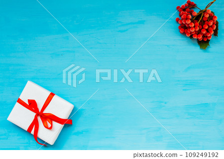 Christmas background with gifts and Christmas tree tea cup fruit Christmas background with gifts and Christmas tree tea cup fruit 109249192