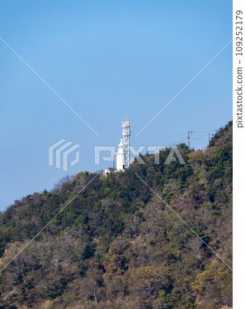 Jizosaki Lighthouse. A lighthouse standing on Jizosaki (Shakagahana) at the southern tip of the Santo Peninsula on Shodoshima. Shodoshima Town, Shodo District, Kagawa Prefecture. (Vertical composition) 109252179