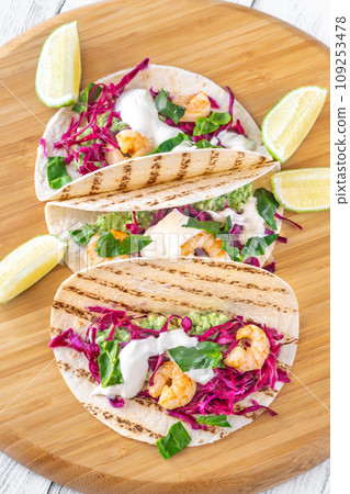 Shrimp red cabbage tacos 109253478