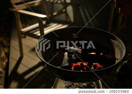 Camping materials Fire pit Burning flame Charcoal Barbecue 109253960