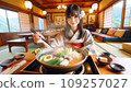 A cute Japanese woman eating hot pot at an inn 109257027