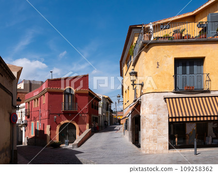 Narrow cobbled streets in old historic district of Santa Coloma de Gramenet 109258362