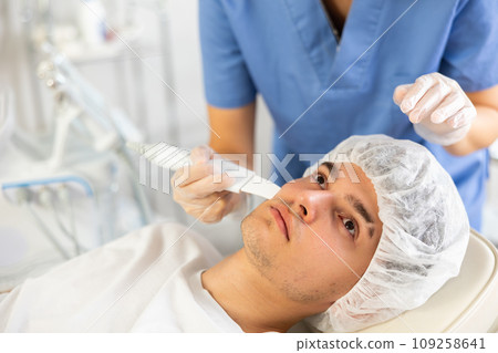 Using Skin Scrubber attachment 109258641