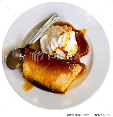 delectable pudding served elegantly delectable pudding served elegantly 109258955