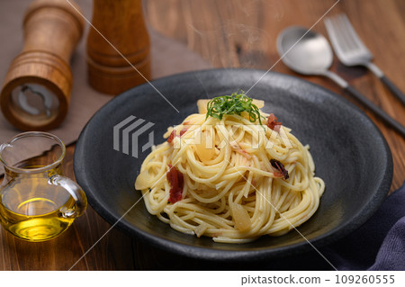 Japanese-style pasta with herring roe and plums Japanese-style pasta with herring roe and plums 109260555