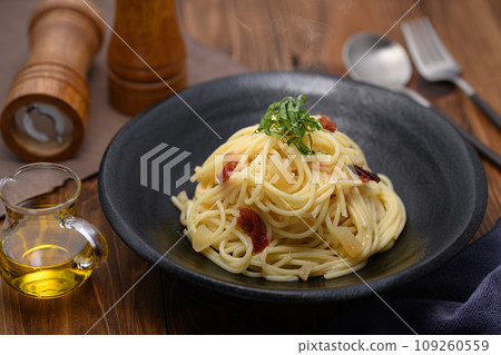 Japanese-style pasta with herring roe and plums 109260559