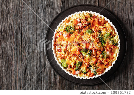 Ham Broccoli Pasta Bake with cheese and croutons 109261782