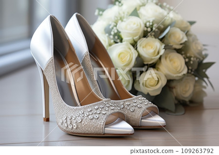 Bride's bouquet and festive shoes 109263792