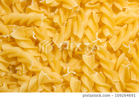 Uncooked Fusilli Pasta Background 109264691