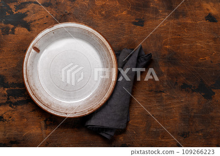 Mockup for a delicious meal. Empty plate on a table Mockup for a delicious meal. Empty plate on a table 109266223