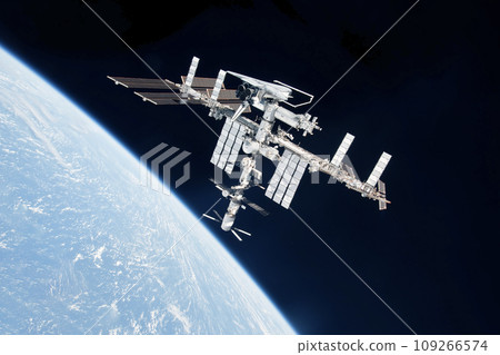 ISS above the surface of planet earth. Elements of this image furnished by NASA ISS above the surface of planet earth. Elements of this image furnished by NASA 109266574