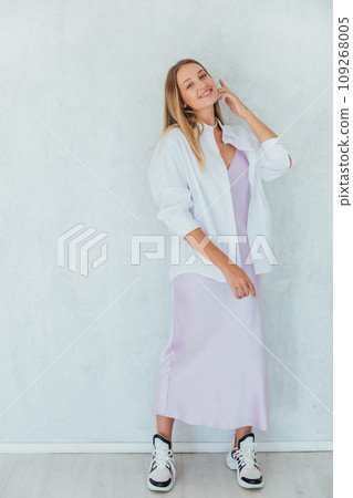 Portrait of a beautiful blonde woman in a dress Portrait of a beautiful blonde woman in a dress 109268005