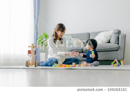 Mother playing with children 109268181
