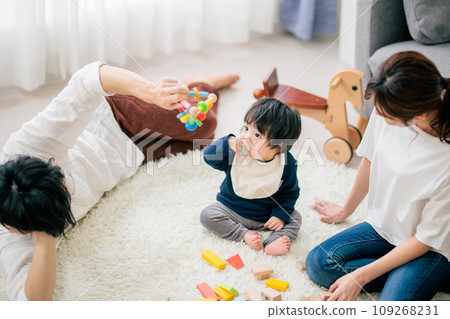 Parents playing with children Parents playing with children 109268231