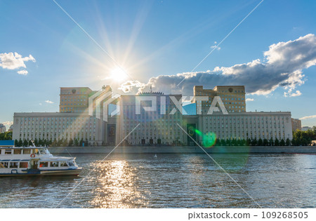 View of the Ministry of Defence of Russian Federation, and Moscow river embakment with cruise ships at sunset. View of the Ministry of Defence of Russian Federation, and Moscow river embakment with cruise ships at sunset. 109268505