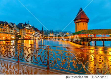 Beautiful historic city of Lucerne with famous Chapel Bridge and Water Tower at twilight time , Switzerland Beautiful historic city of Lucerne with famous Chapel Bridge and Water Tower at twilight time , Switzerland 109270542