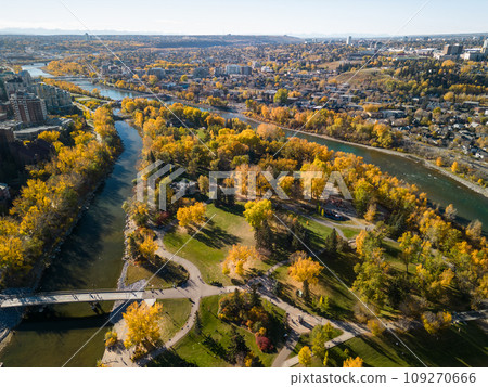 Prince's Island Park autumn foliage scenery. Aerial view of Downtown City of Calgary, Alberta, Canada. 109270666