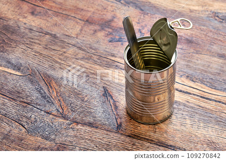 Canned food on a wooden table Canned food on a wooden table 109270842