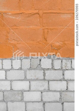 Old White Silicate Blocks Brick Vertical Wall Two Colors Orange Peach Paint Texture Background 109270993