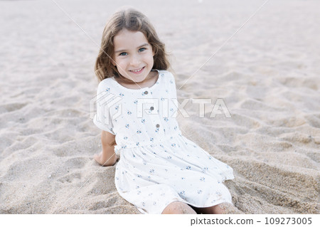 Little girl enjoying summer vacation at the sea Little girl enjoying summer vacation at the sea 109273005