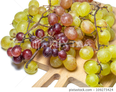 Grapes on a white background. berries for wine. Berry isolate. Sweet grapes kishmish. Raw food diet. Grapes on a white background. berries for wine. Berry isolate. Sweet grapes kishmish. Raw food diet. 109273424