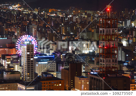 Susukino's Ferris wheel Noria (nORIA) seen from the JR Tower observation deck "Tower Three Eight" in Sapporo Susukino's Ferris wheel Noria (nORIA) seen from the JR Tower observation deck "Tower Three Eight" in Sapporo 109273507