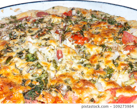 Assorted pizza background. Homemade vegetable pie. Open pie. Caloric nutrition. Pizza with tomatoes, cheese, herbs and eggs. homemade food Assorted pizza background. Homemade vegetable pie. Open pie. Caloric nutrition. Pizza with tomatoes, cheese, herbs and eggs. homemade food 109273984