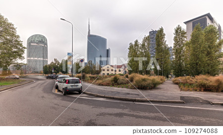Panorama showing skyscrapers and towers from park with green lawn timelapse in Milan 109274088