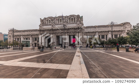Panorama showing Milano Centrale timelapse - the main central railway station of the city of Milan in Italy. Panorama showing Milano Centrale timelapse - the main central railway station of the city of Milan in Italy. 109274090