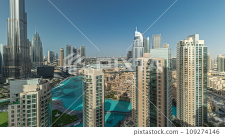 Panorama showing Dubai Downtown cityscape with tallest skyscrapers around aerial timelapse. Panorama showing Dubai Downtown cityscape with tallest skyscrapers around aerial timelapse. 109274146