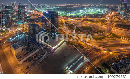 Huge highway crossroad junction between JLT district and media city aerial day to night timelapse. 109274281
