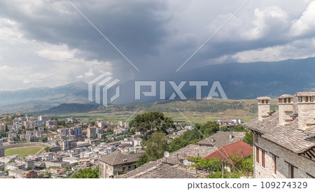 Panorama showing Gjirokastra city from the viewpoint with many typical historic houses of Gjirokaster timelapse. 109274329