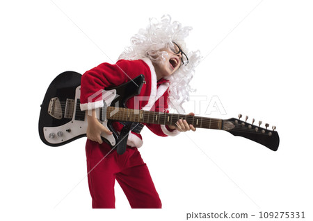 Boy dressed as Santa Claus with a guitar on a white background 109275331
