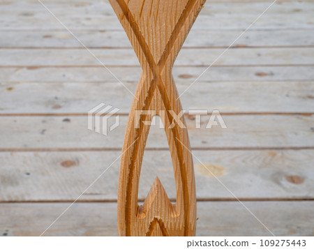 Carved wooden rail. Beautiful handrails. Wooden decoration on the fence. Fine work. 109275443