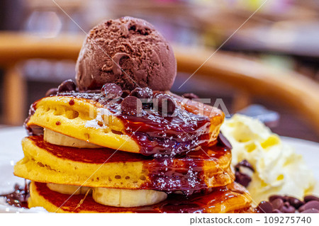 Decadent Delights Indulging in Chocolate Kahlua Pancakes with Espresso Mascarpone and Premium Chocolate Ice Cream Decadent Delights Indulging in Chocolate Kahlua Pancakes with Espresso Mascarpone and Premium Chocolate Ice Cream 109275740