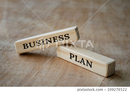 Business plan text on wooden blocks. Business concept. Business plan text on wooden blocks. Business concept. 109276522
