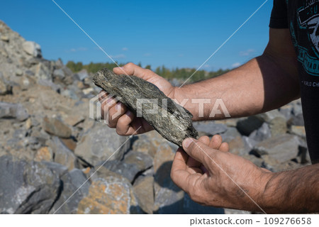 Industrial Mining Area with Graphite Deposit, Mineral Production, and Abundant Stones 109276658