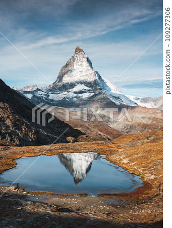 Riffelsee lake and Matterhorn mountain reflection at Switzerland Riffelsee lake and Matterhorn mountain reflection at Switzerland 109277306