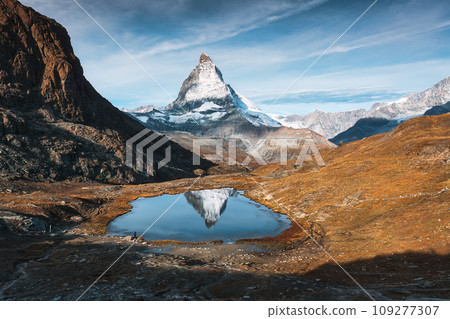Riffelsee lake and Matterhorn mountain reflection at Switzerland 109277307