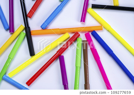 Multicolored felt-tip pens close-up on a white background, the concept of creativity,creativity and education. Multicolored felt-tip pens close-up on a white background, the concept of creativity,creativity and education. 109277659